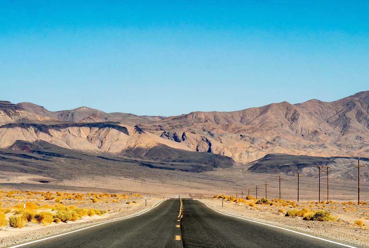 death valley grey asphalt road near mountains highway